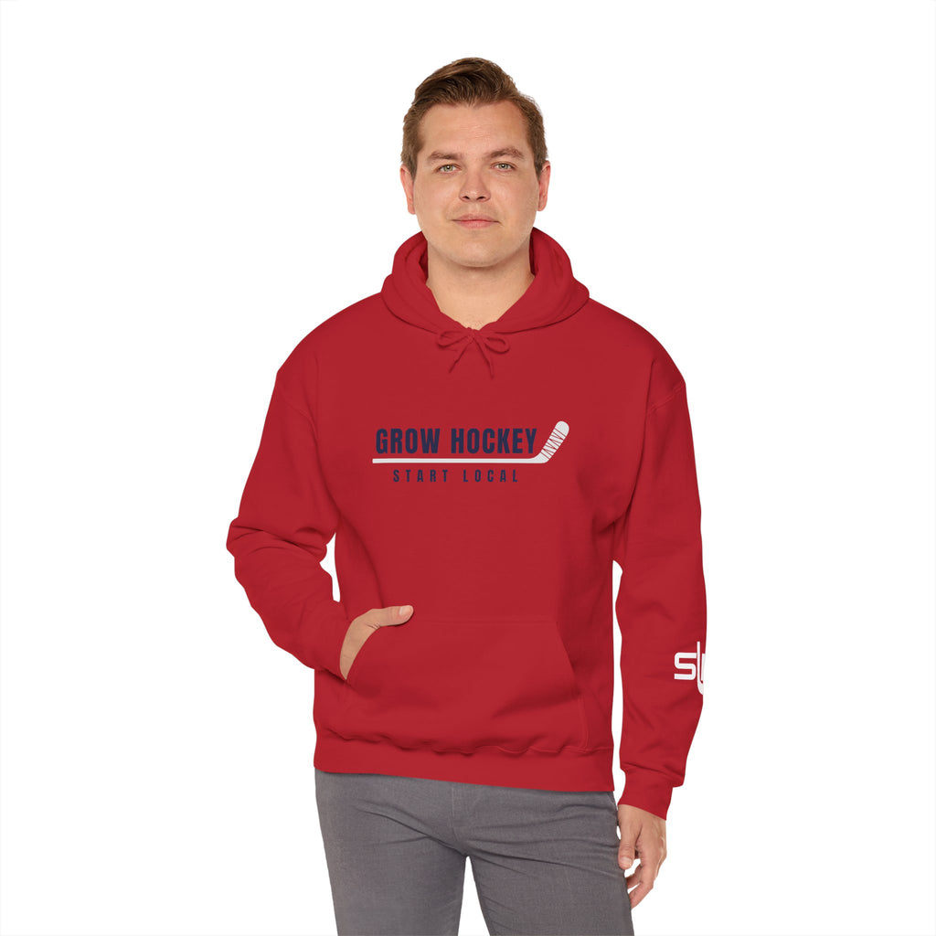 Male model wearing Grow Hockey Start Local hoodie with bold front graphic and taped hockey stick design.