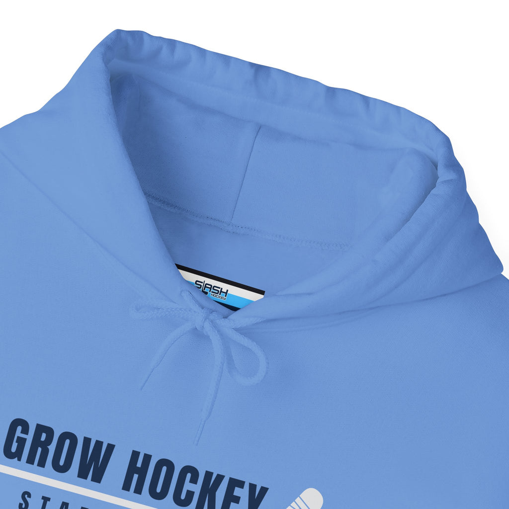 Inside collar tag of Grow Hockey hoodie with Slash Hockey branding and size information.