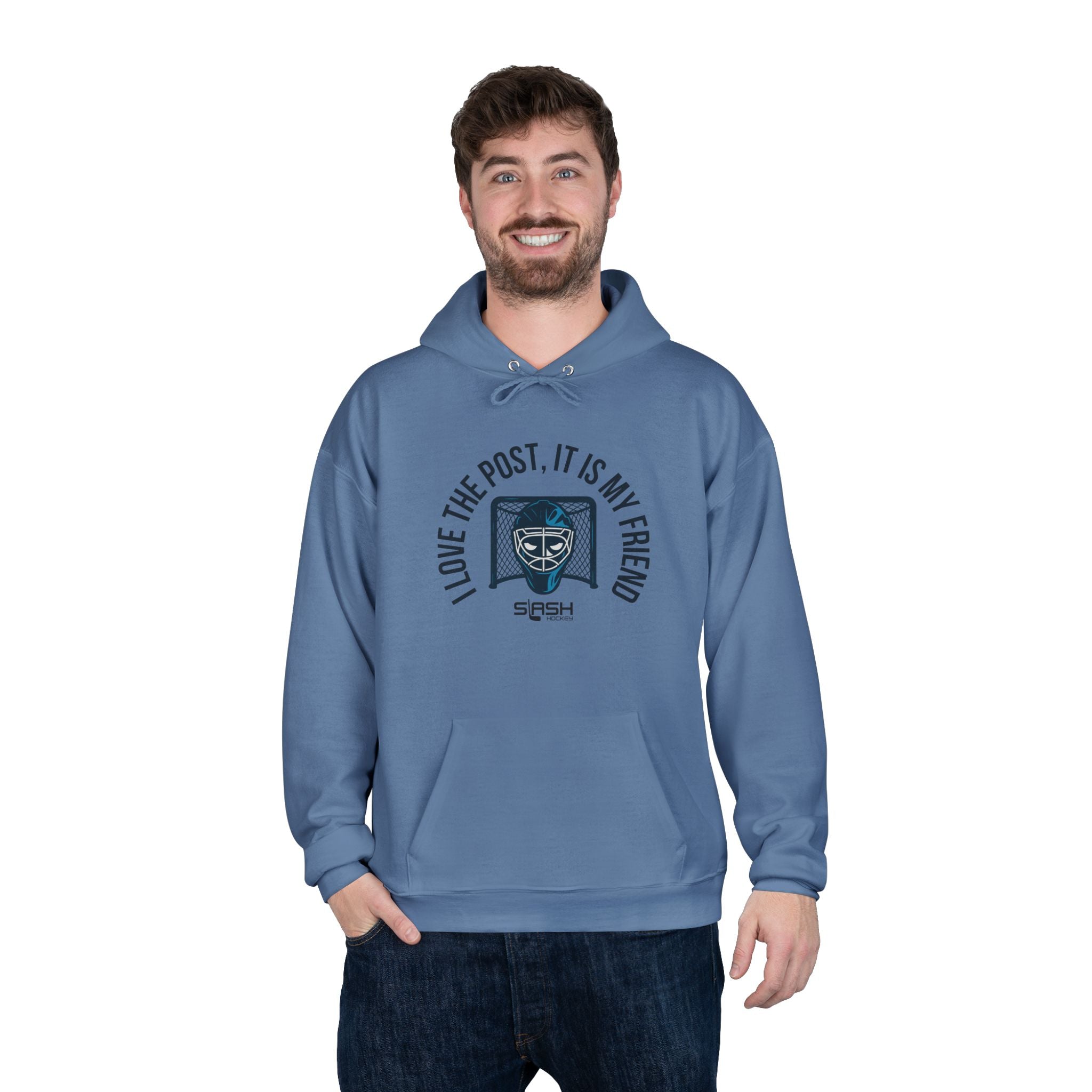 Male model wearing goalie hoodie with “I love the post, it is my friend” design, standing in casual hockey-inspired setting.