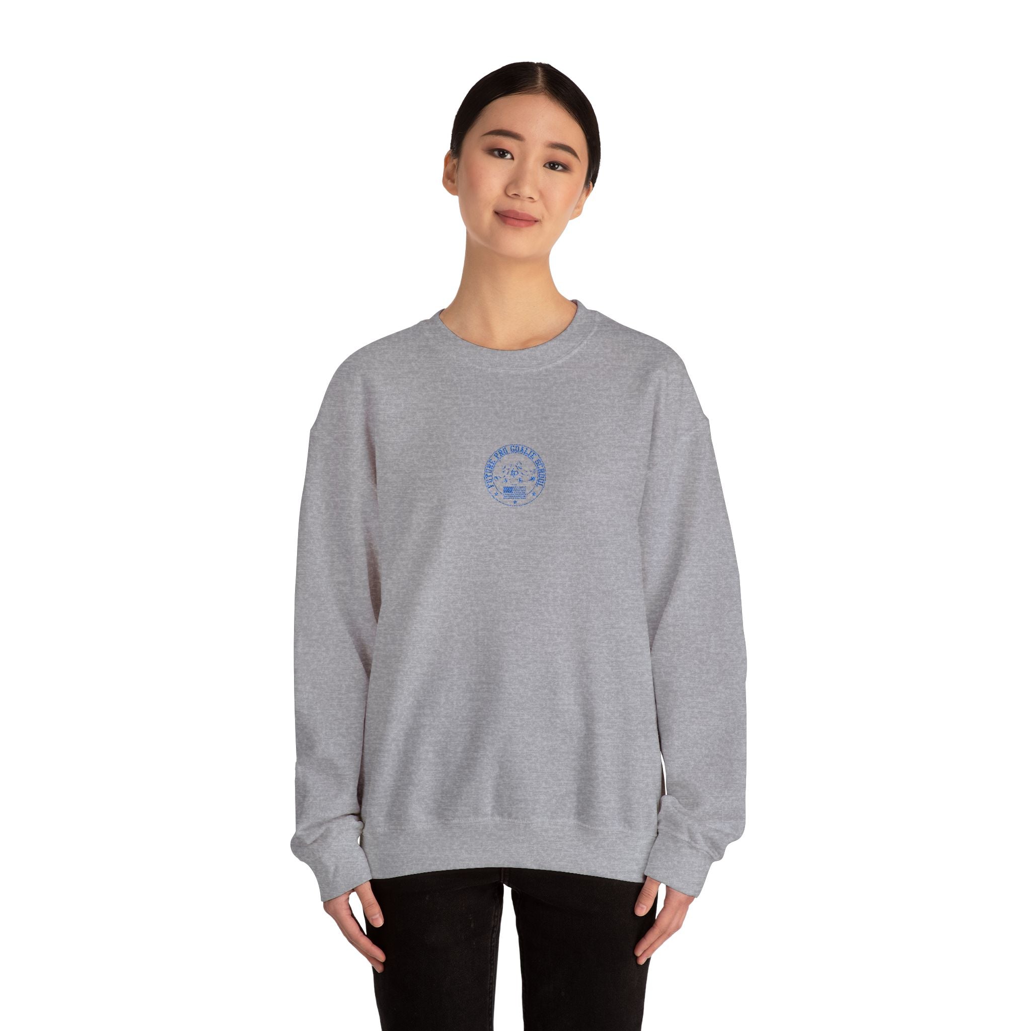 Female model wearing the grey Future Pro USA Goalie School Crewneck, showcasing the clean design, understated embroidery, and unisex fit.