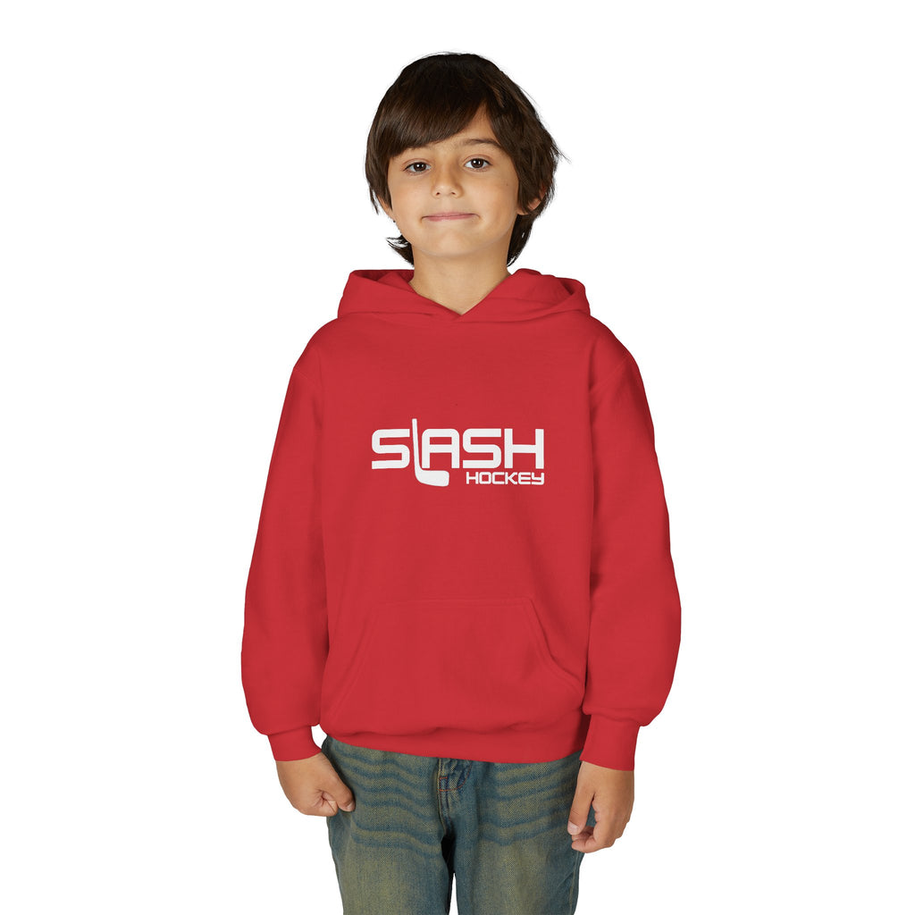 Boy wearing the Youth Slash Hockey Hoodie, front view, standing in a casual hockey setting.
