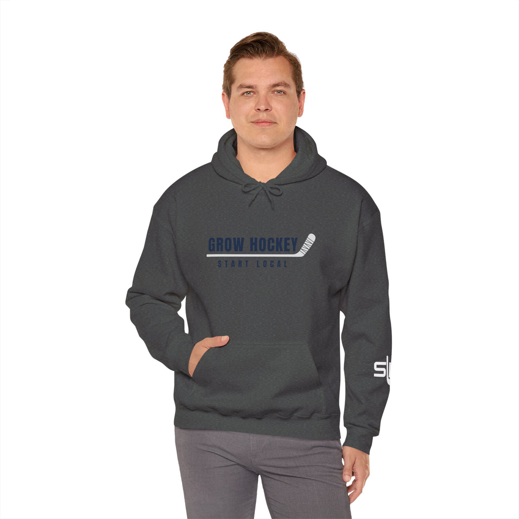 Male model wearing Grow Hockey Start Local hoodie with bold front graphic and taped hockey stick design.