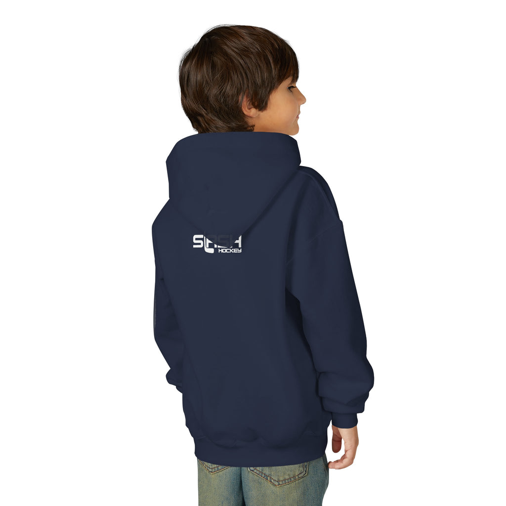 Young male model wearing the youth navy blue Future Pro USA Goalie School hoodie, back view, showing the hoodie fit and silhouette in a casual setting.