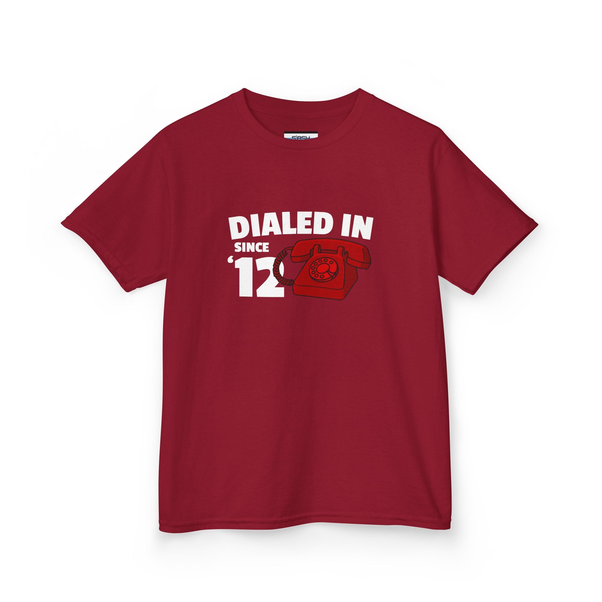 Youth Dialed In Since ’12 Tee, front view — youth hockey t-shirt featuring a bold “Dialed In Since ’12” graphic on the chest, clean athletic fit, displayed on a plain background.