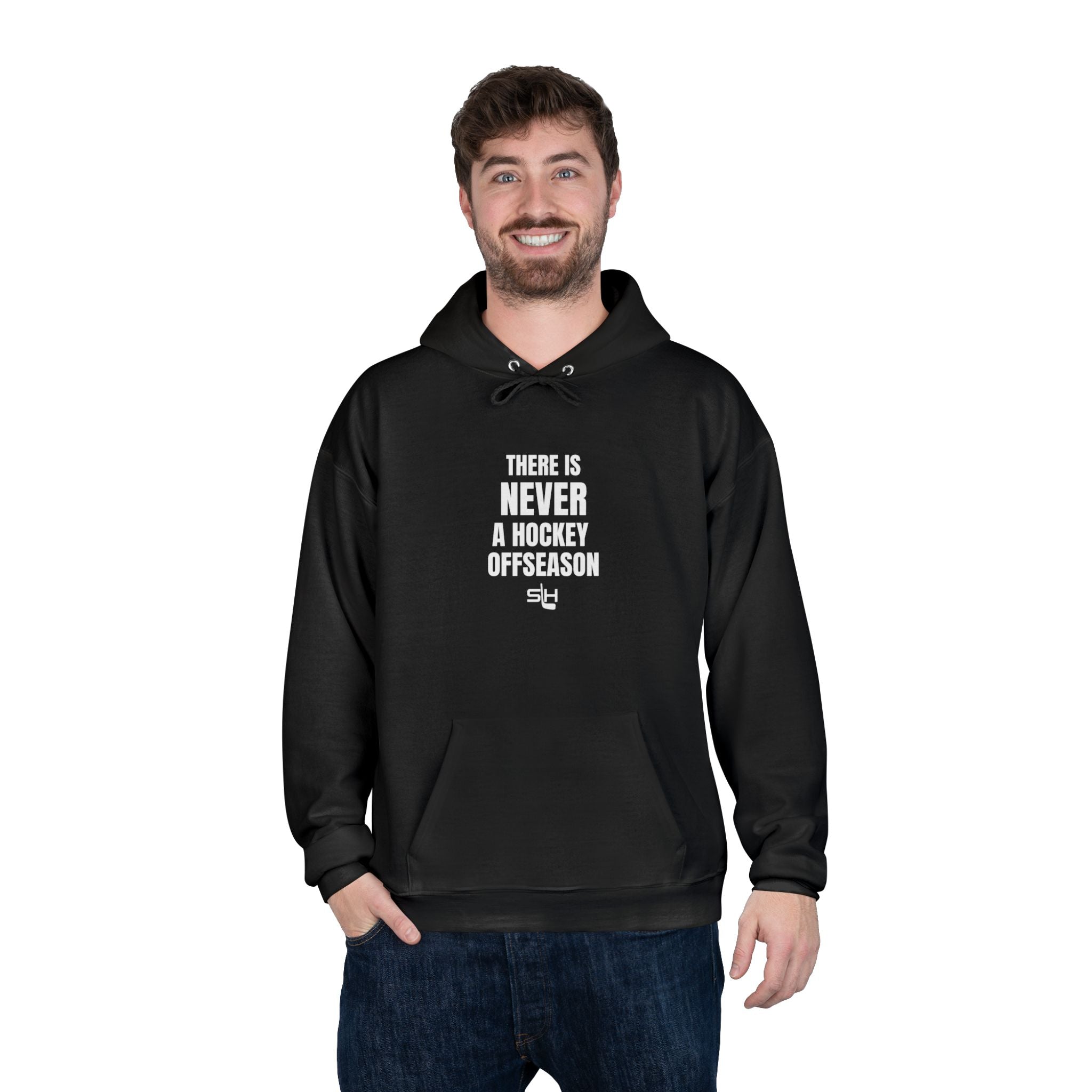 Male hockey fan wearing navy ‘Never a Hockey Offseason’ hoodie by Slash Hockey, casual rinkside style.