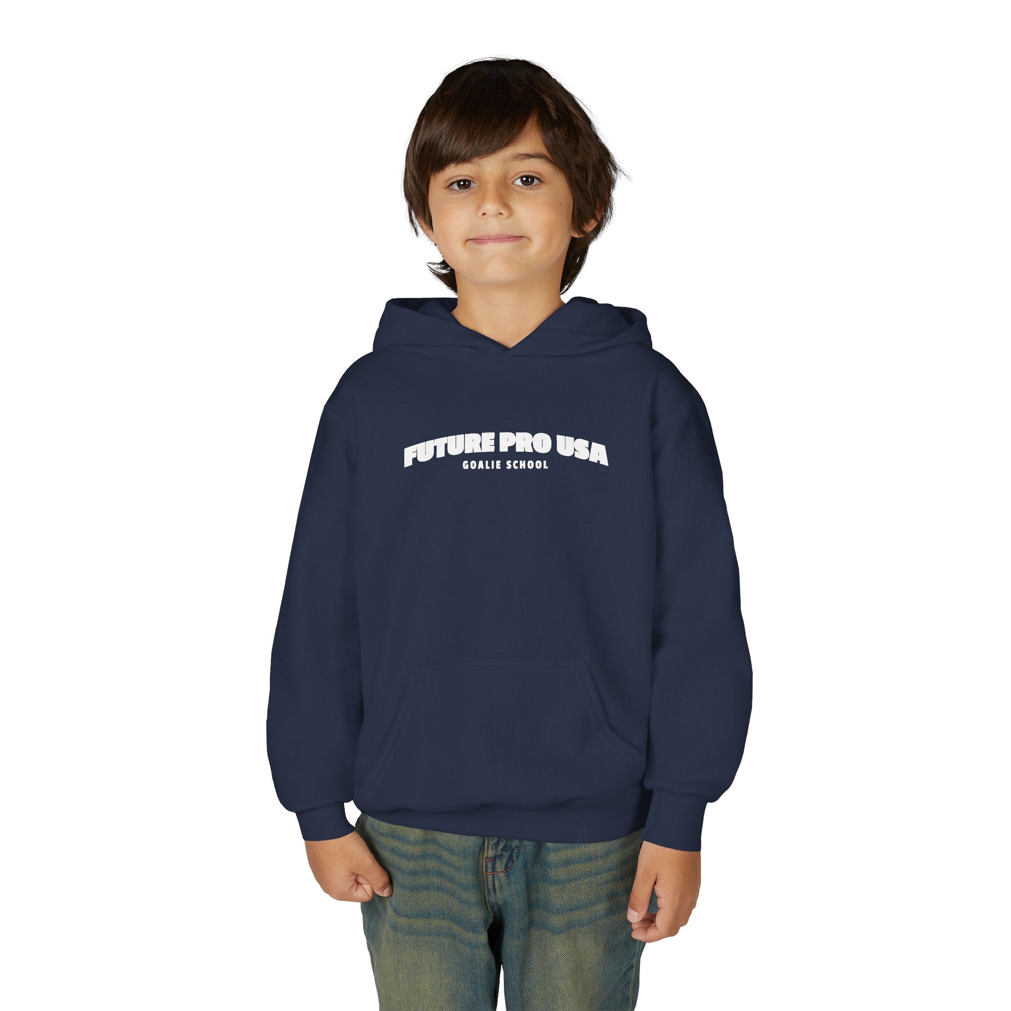 Young male model wearing the youth navy blue Future Pro USA Goalie School hoodie, front view, standing in a casual off-ice setting.