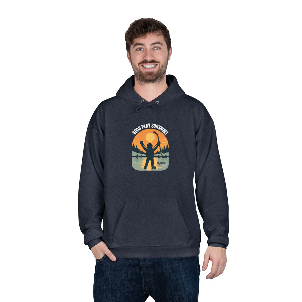 Male model wearing the Good Play Sunshine! Hoodie outdoors on a winter day, showing the nostalgic hockey graphic and comfortable athletic fit.