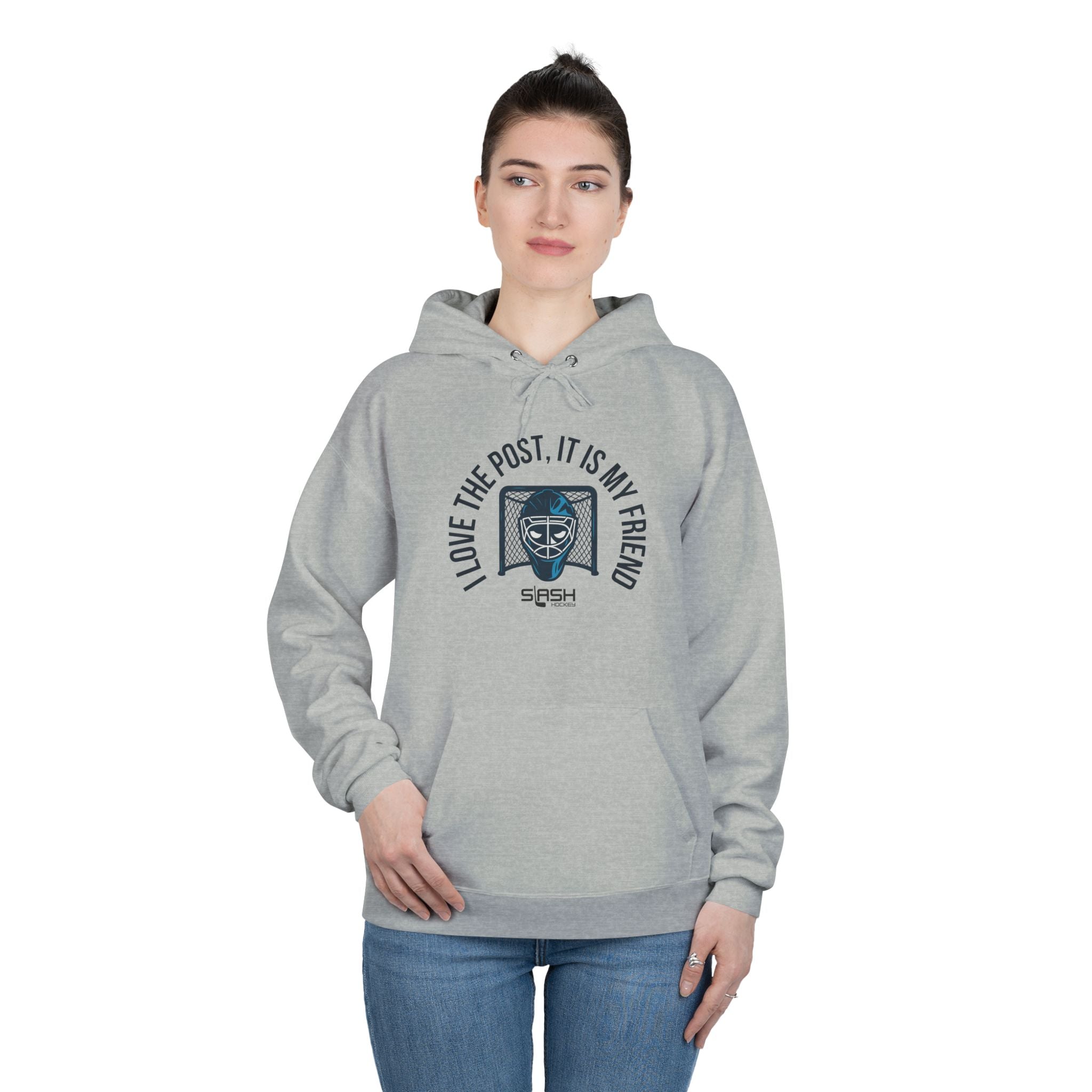 Female model wearing goalie hoodie with “I love the post, it is my friend” design, styled casually for everyday hockey culture look.