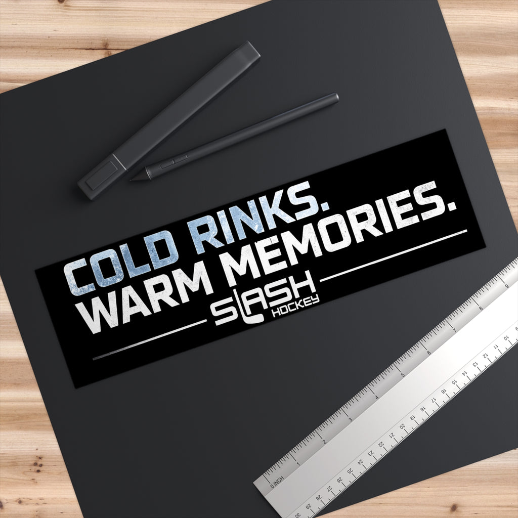 Cold Rinks Warm Memories hockey bumper sticker measuring 11 inches by 3 inches shown on paper with ruler for size reference.