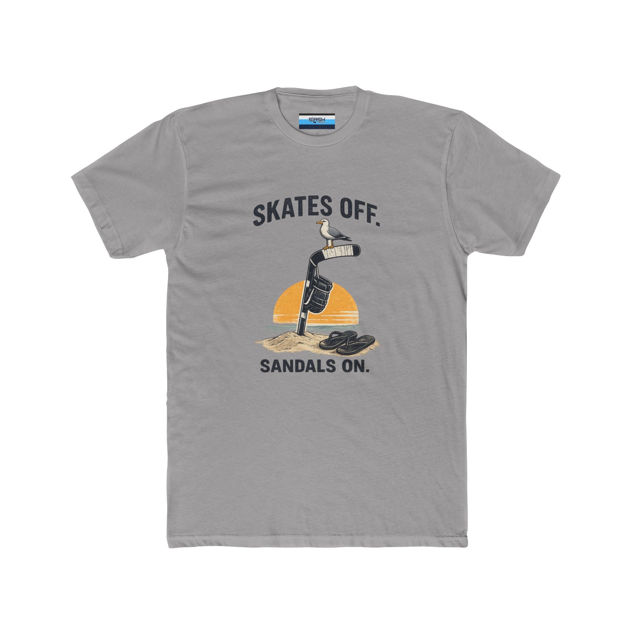 Front view of the Skates Off. Sandals On. hockey t-shirt featuring a vintage beach-inspired graphic with a hockey stick planted in the sand, a hockey glove hanging from the shaft, a seagull perched on the blade, flip-flops resting nearby, and a sunset backdrop. Bold text reads "SKATES OFF." above the design and "SANDALS ON." below.