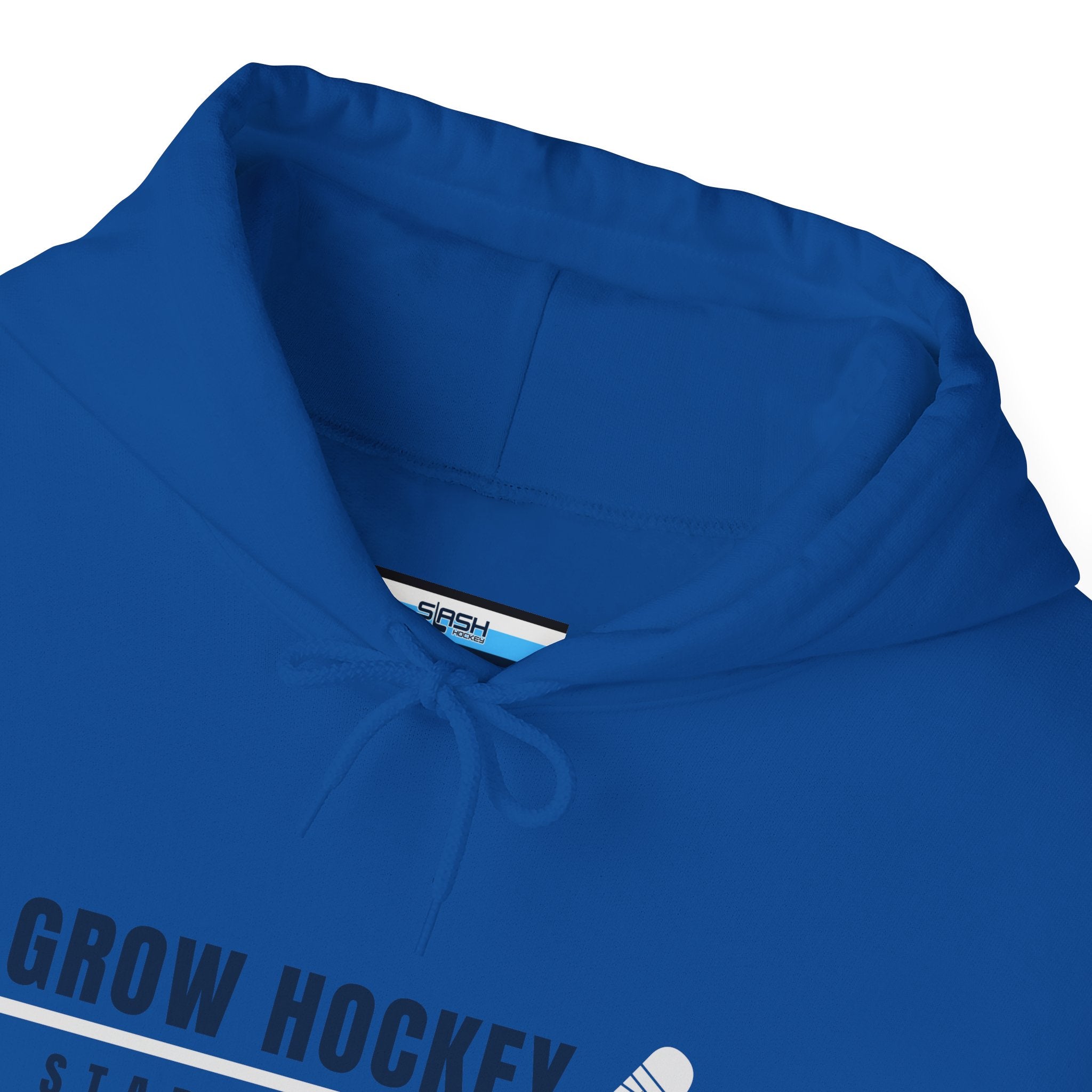 Inside collar tag of Grow Hockey hoodie with Slash Hockey branding and size information.