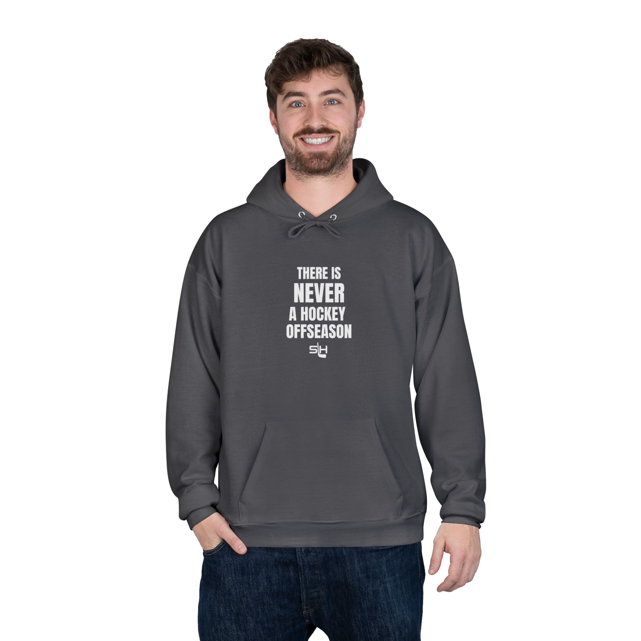 Male hockey fan wearing navy ‘Never a Hockey Offseason’ hoodie by Slash Hockey, casual rinkside style.