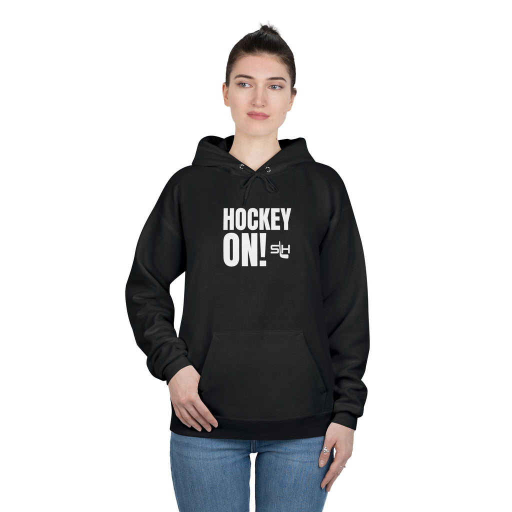 “Hockey On! hoodie lifestyle photo — model wearing hockey culture hoodie with Hockey On! design, styled for rink, travel, or everyday casual wear.”