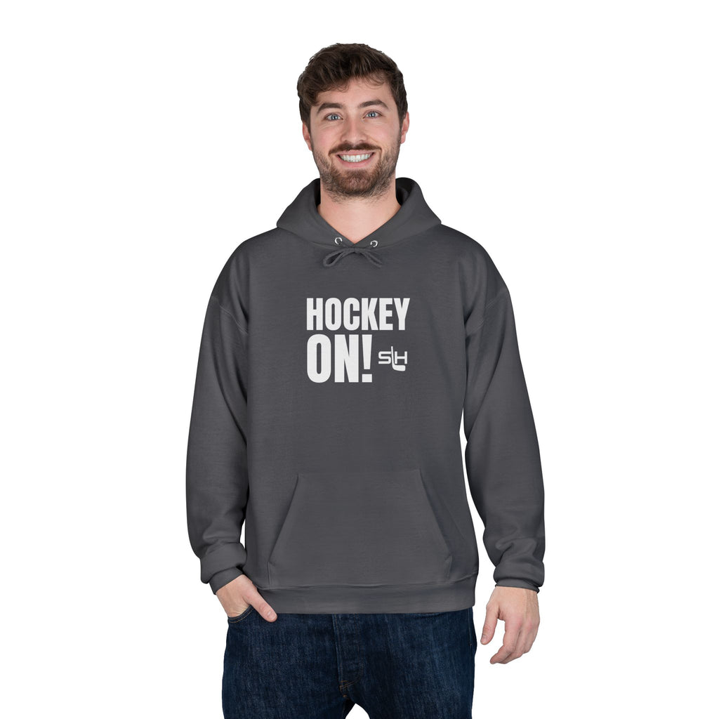 “Hockey On! hoodie lifestyle photo — model wearing hockey culture hoodie with Hockey On! design, styled for rink, travel, or everyday casual wear.”