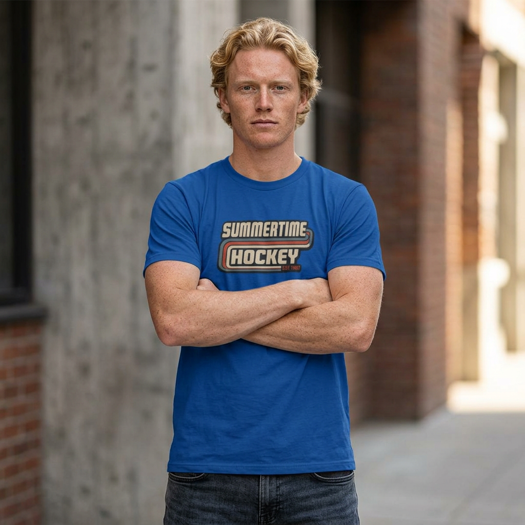 Male model wearing the Summertime Hockey vintage t-shirt featuring a retro hockey graphic inspired by classic 1980s hockey apparel from Slash Hockey.