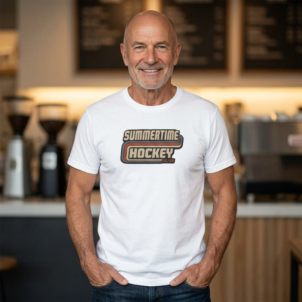 Male model wearing the Summertime Hockey vintage t-shirt featuring a retro hockey graphic inspired by classic 1980s hockey apparel from Slash Hockey.