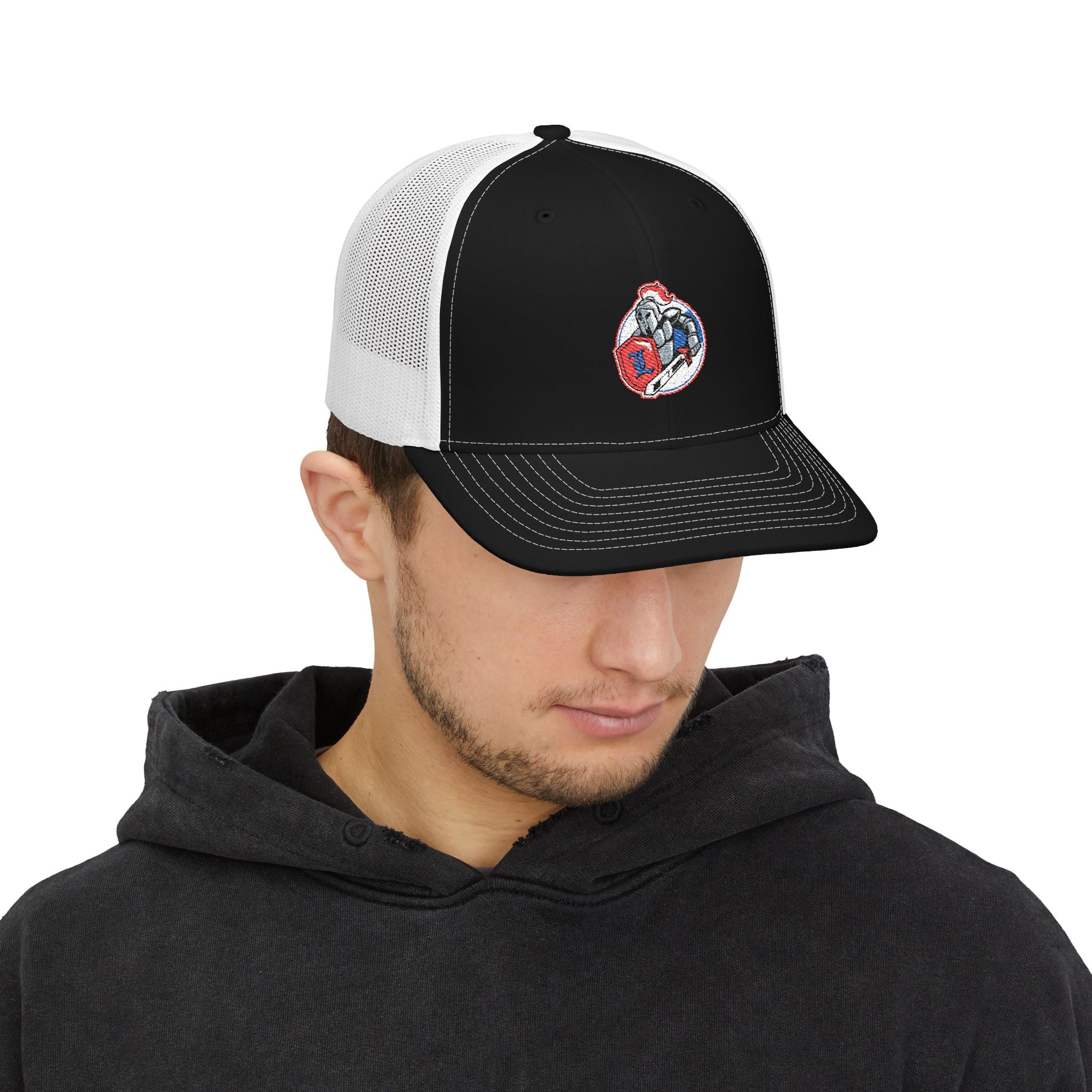 Person wearing the LHA Snapback Cap, showcasing the clean embroidered logo and structured fit. The cap adds a classic hockey look to casual, rinkside style.
