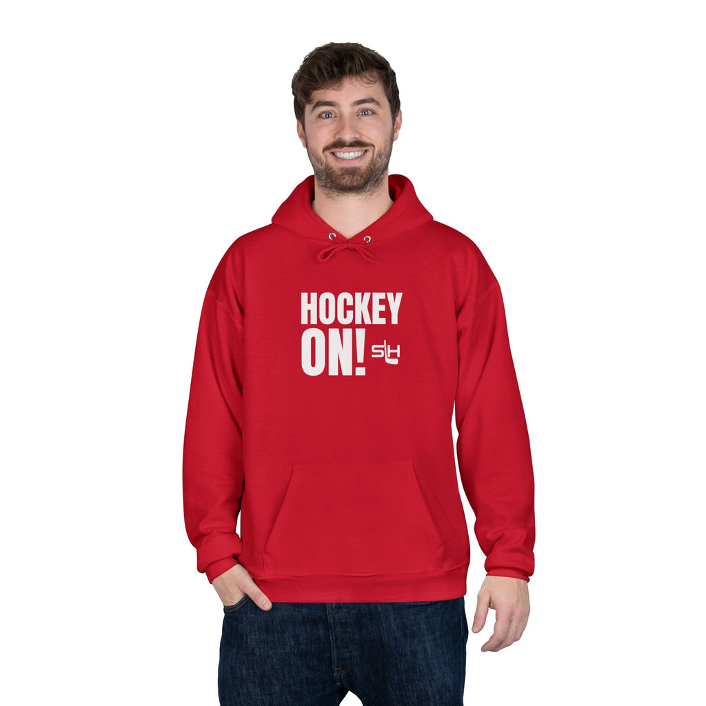 “Hockey On! hoodie lifestyle photo — model wearing hockey culture hoodie with Hockey On! design, styled for rink, travel, or everyday casual wear.”