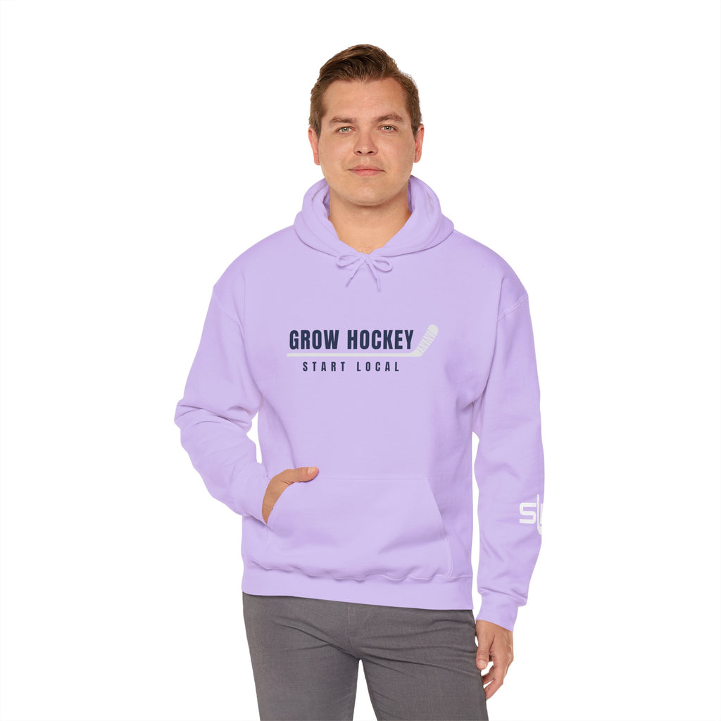 Male model wearing Grow Hockey Start Local hoodie with bold front graphic and taped hockey stick design.