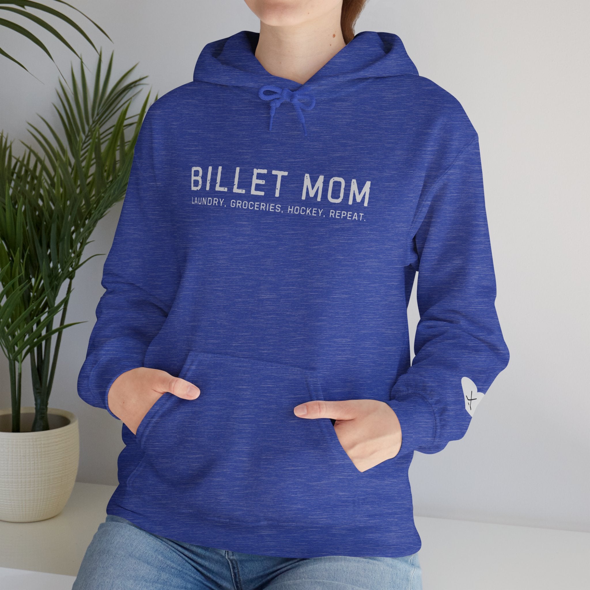 Woman wearing Billet Mom hoodie representing the life of a junior hockey billet mom supporting players and host families