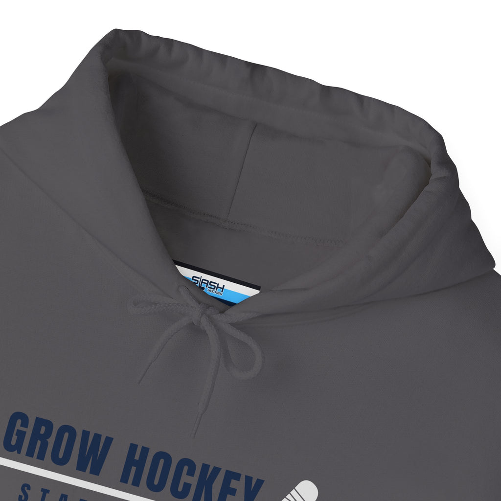 Inside collar tag of Grow Hockey hoodie with Slash Hockey branding and size information.