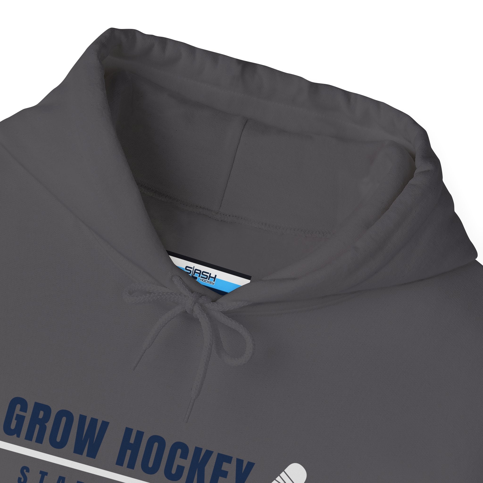 Inside collar tag of Grow Hockey hoodie with Slash Hockey branding and size information.