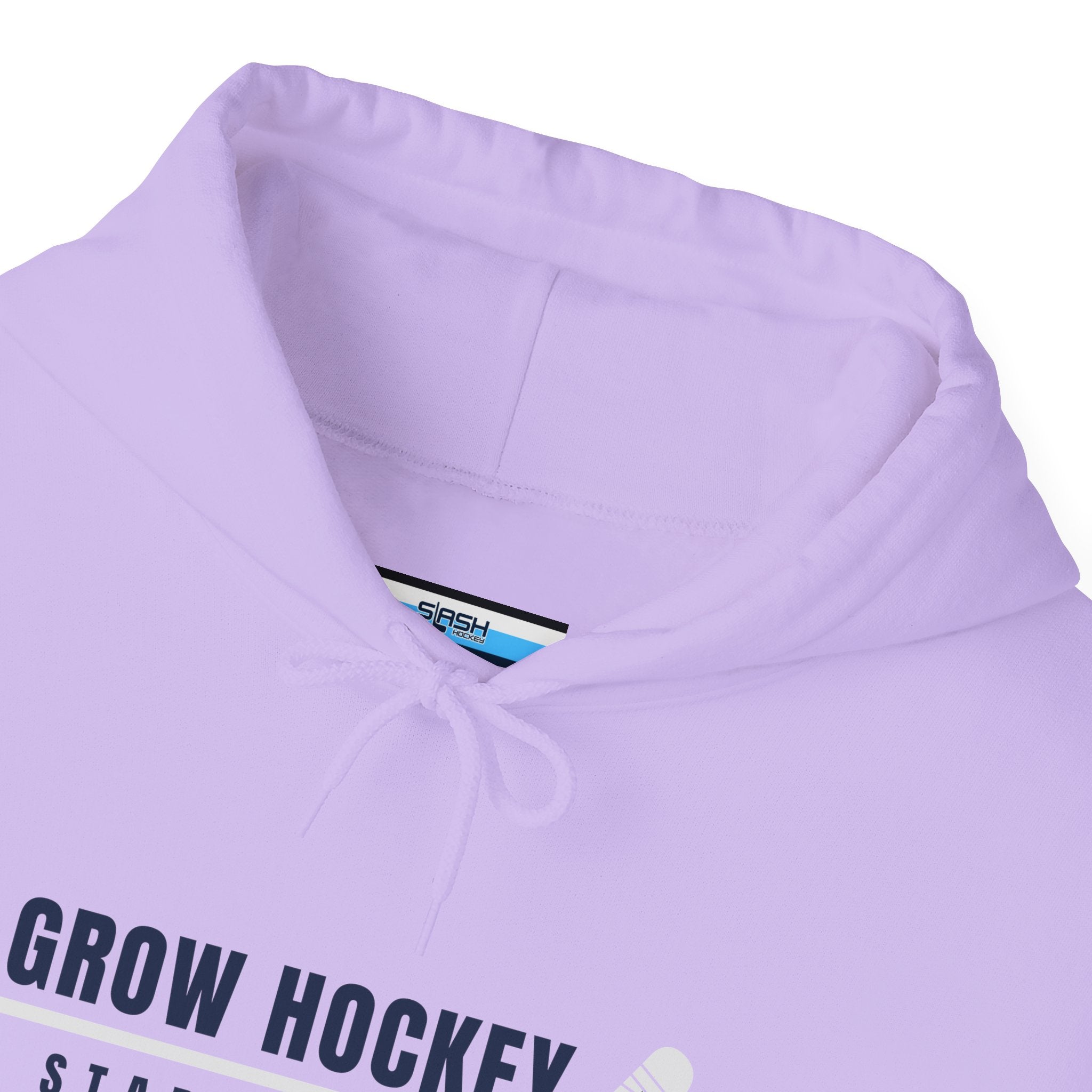 Inside collar tag of Grow Hockey hoodie with Slash Hockey branding and size information.