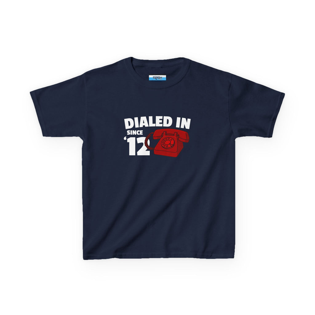 Youth Dialed In Since ’12 Tee, front view — youth hockey t-shirt featuring a bold “Dialed In Since ’12” graphic on the chest, clean athletic fit, displayed on a plain background.
