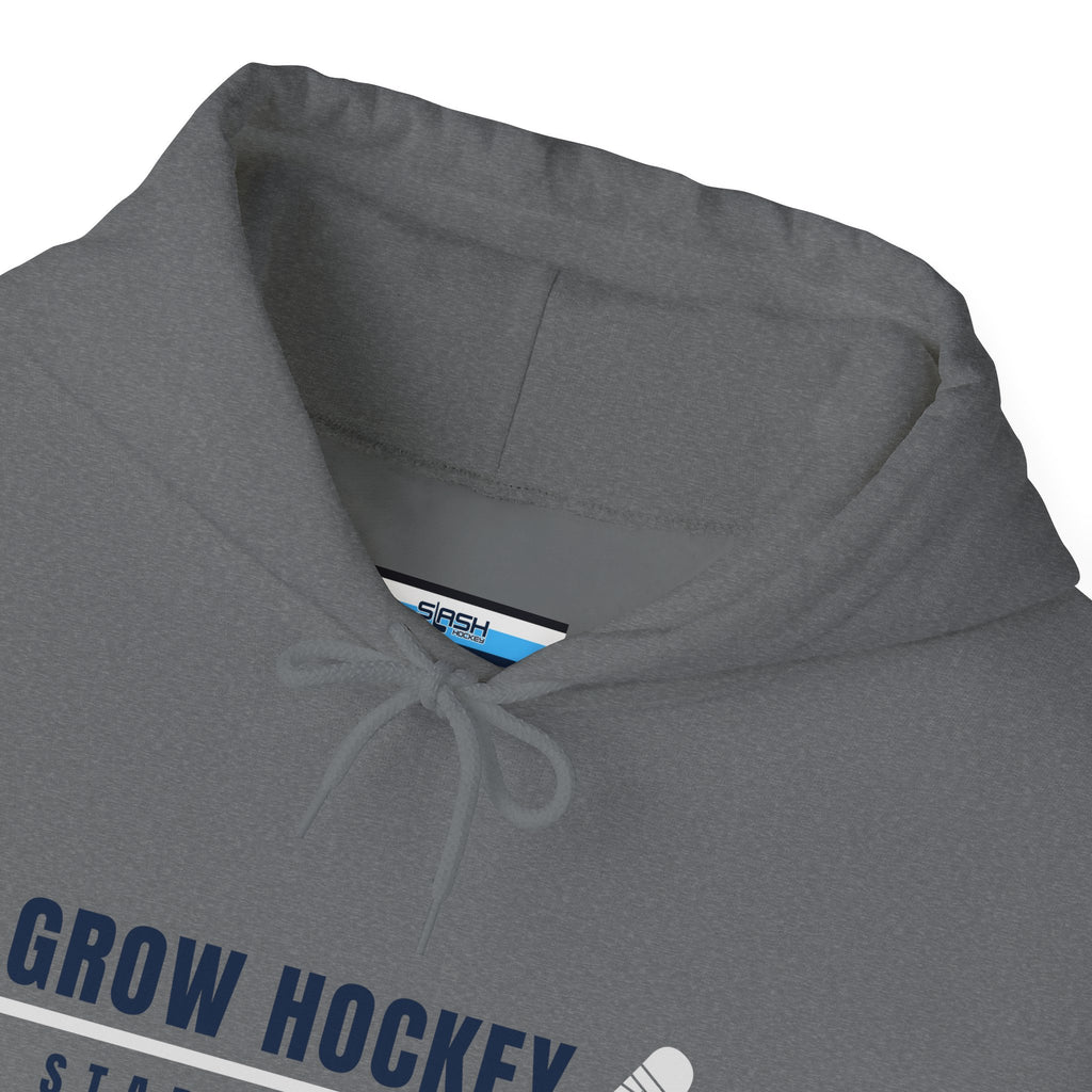 Inside collar tag of Grow Hockey hoodie with Slash Hockey branding and size information.