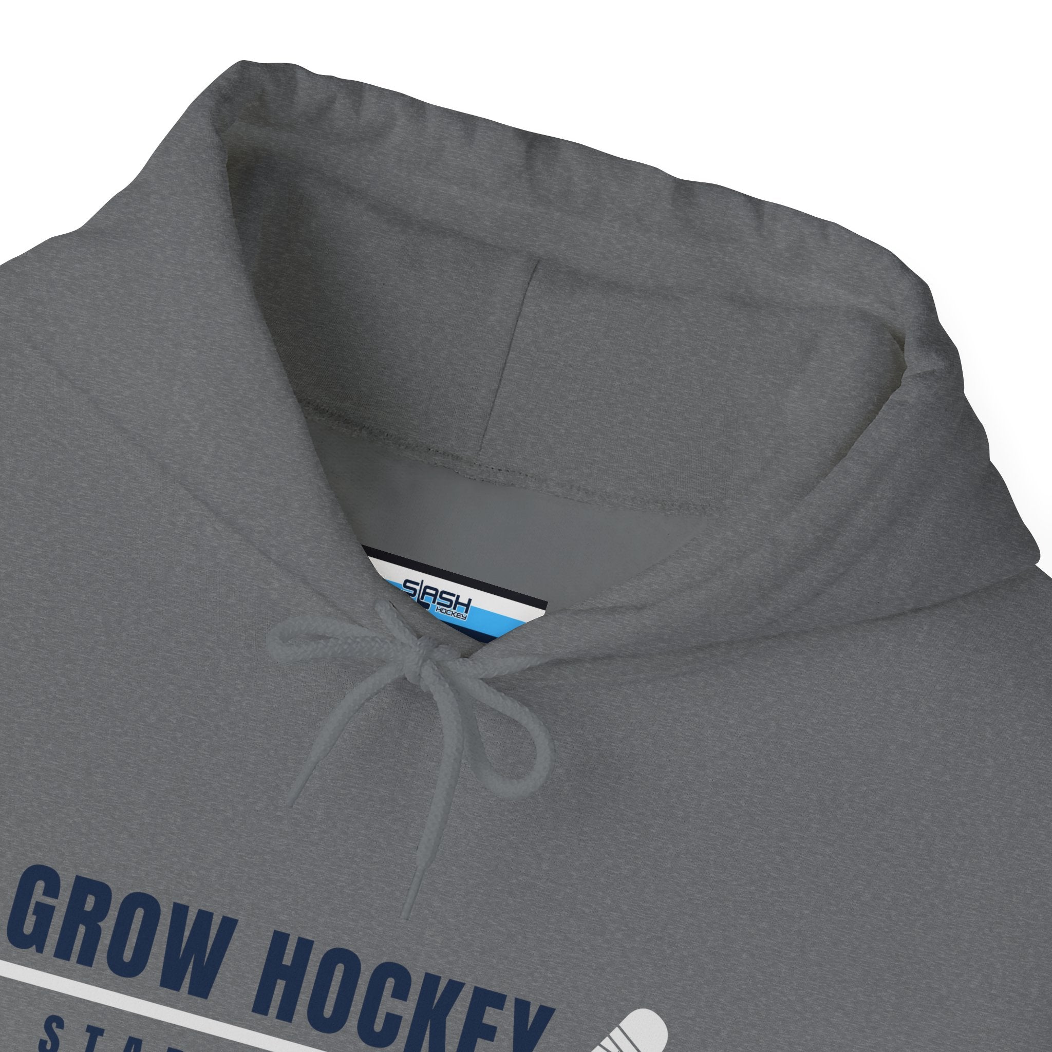 Inside collar tag of Grow Hockey hoodie with Slash Hockey branding and size information.