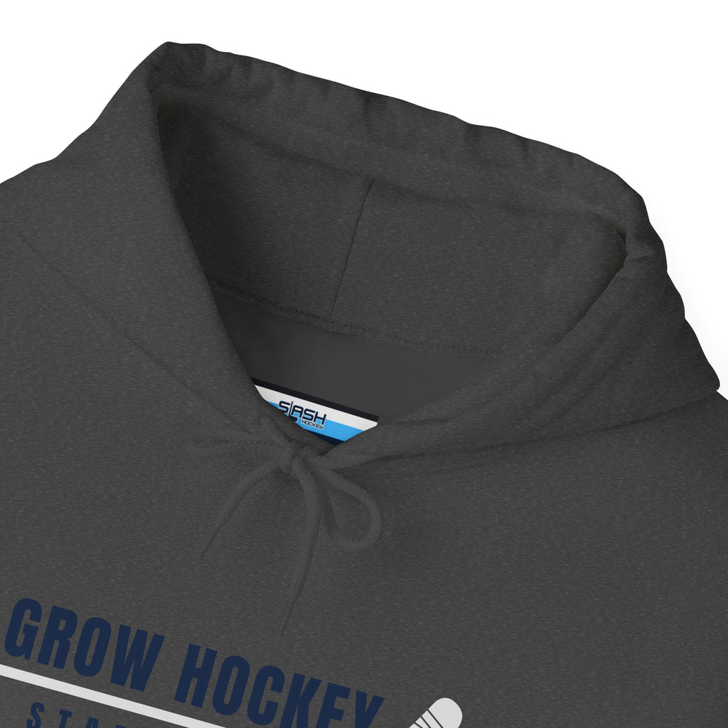 Inside collar tag of Grow Hockey hoodie with Slash Hockey branding and size information.