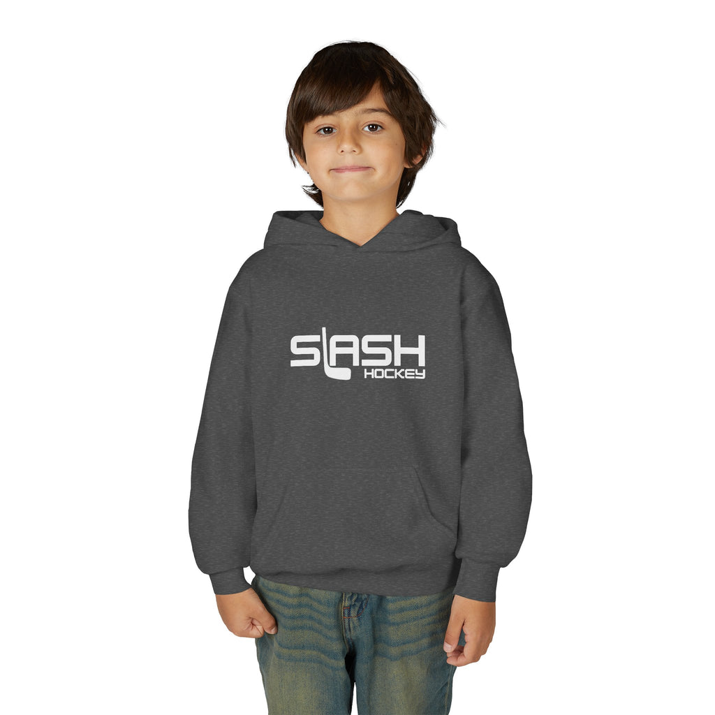 Boy wearing the Youth Slash Hockey Hoodie, front view, standing in a casual hockey setting.
