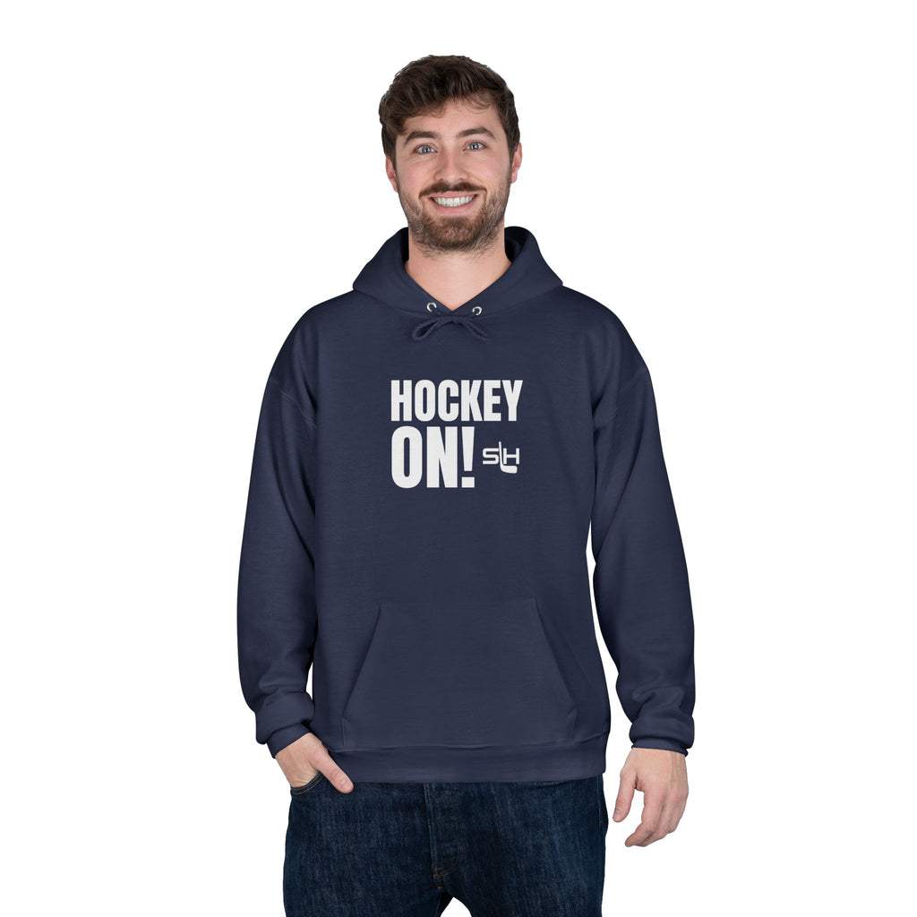 “Hockey On! hoodie lifestyle photo — model wearing hockey culture hoodie with Hockey On! design, styled for rink, travel, or everyday casual wear.”