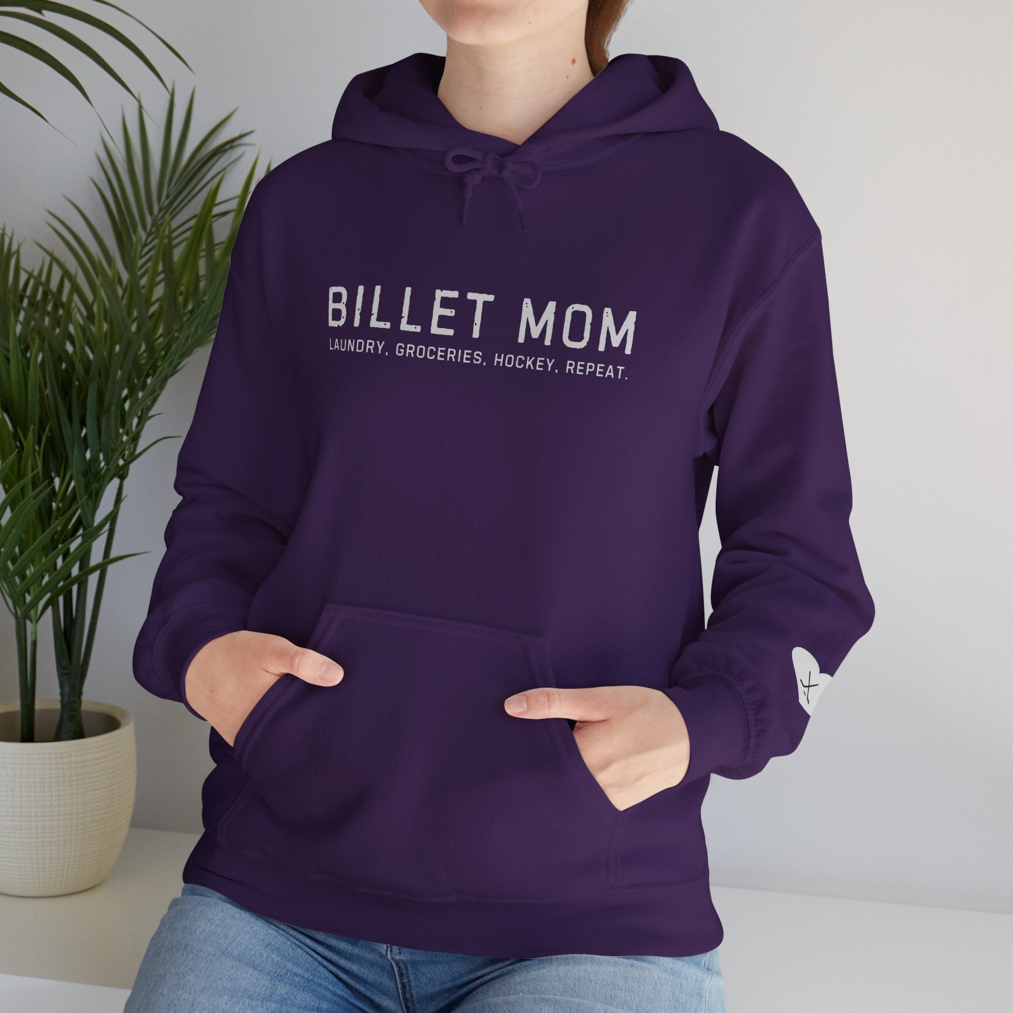 Woman wearing Billet Mom hoodie representing the life of a junior hockey billet mom supporting players and host families