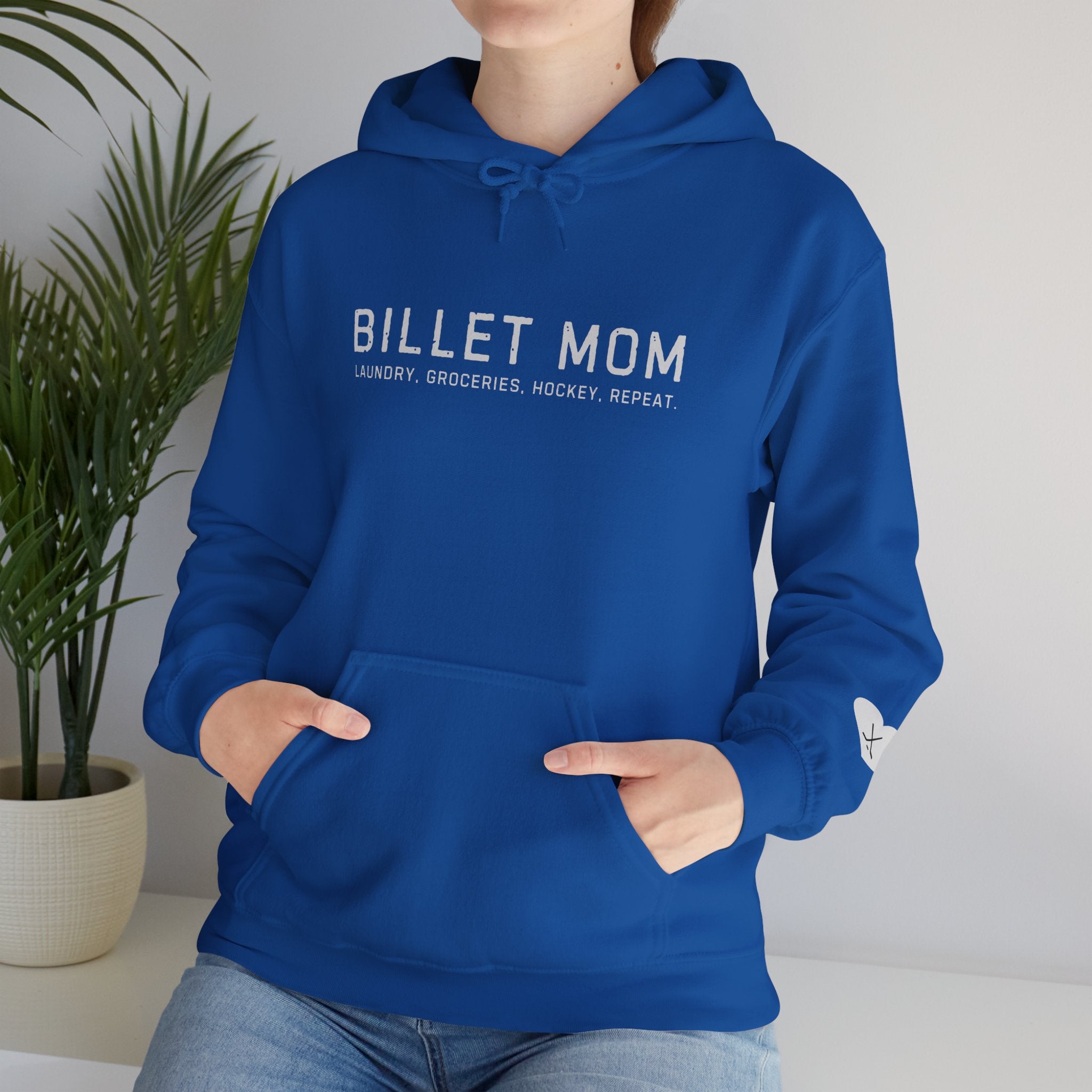 Woman wearing Billet Mom hoodie representing the life of a junior hockey billet mom supporting players and host families
