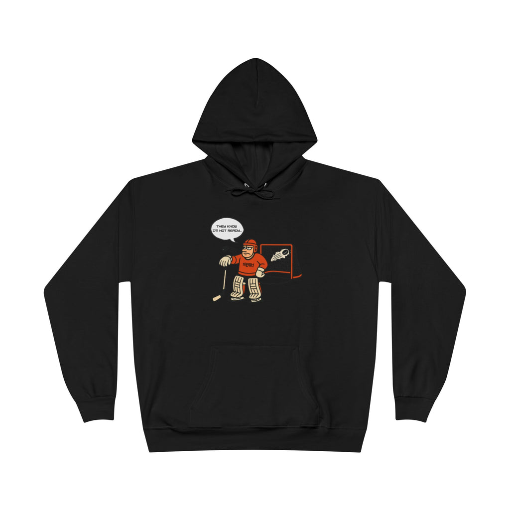 “Mad Goalie Hockey Hoodie front view — bold graphic design featuring angry goalie mask illustration with distressed text, printed in navy, sky blue, and white on premium cotton-blend hoodie.”