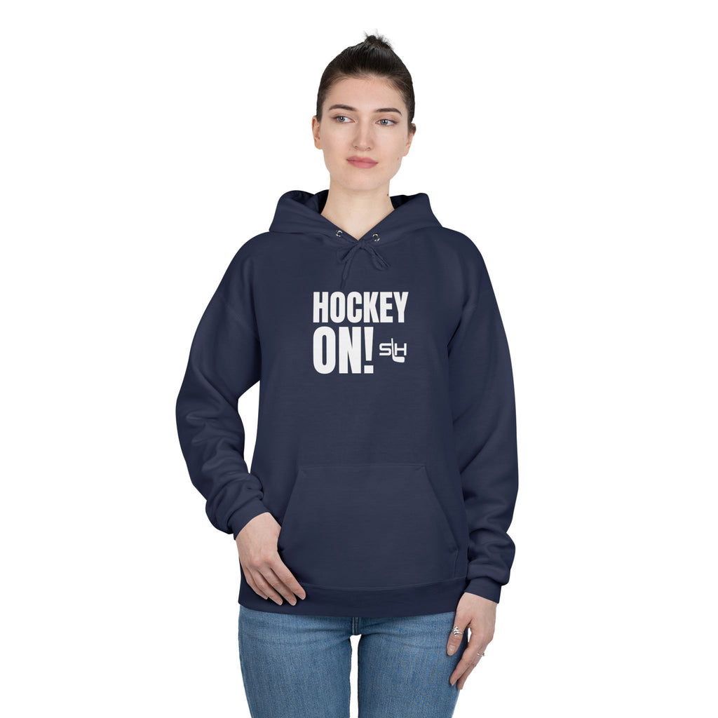 “Hockey On! hoodie lifestyle photo — model wearing hockey culture hoodie with Hockey On! design, styled for rink, travel, or everyday casual wear.”