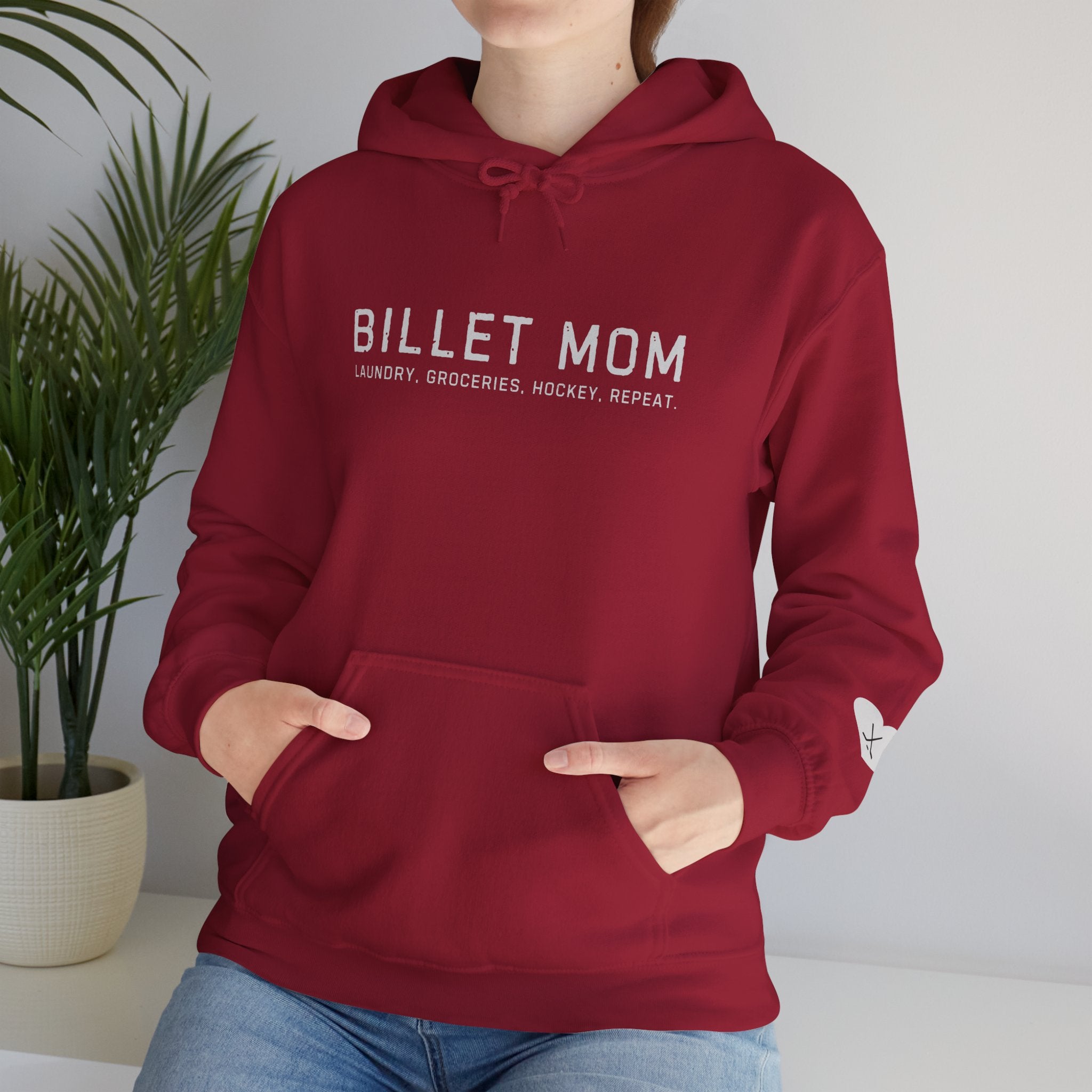 Woman wearing Billet Mom hoodie representing the life of a junior hockey billet mom supporting players and host families